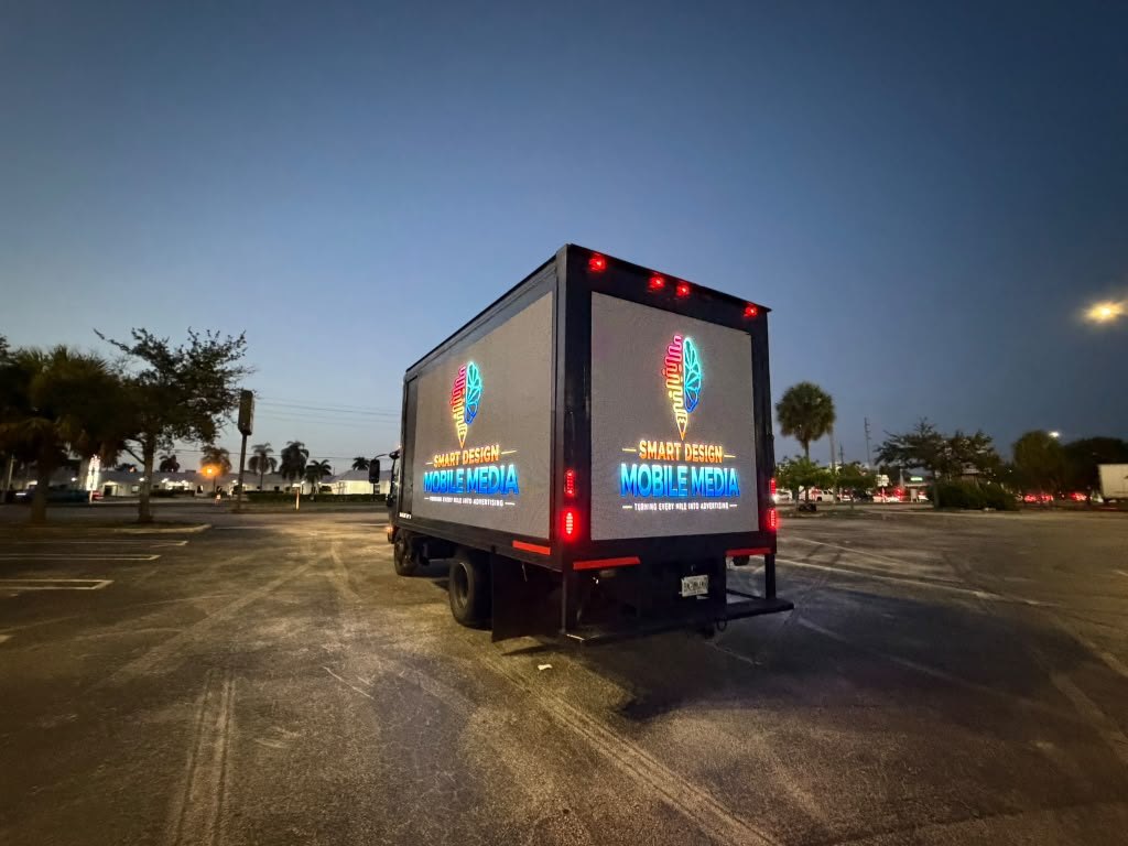LED billboard truck rear and side screens lit simultaneously